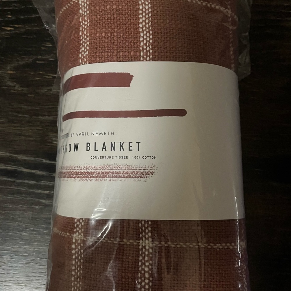 Fab Fit Fun throw. New in bag. Rust color.